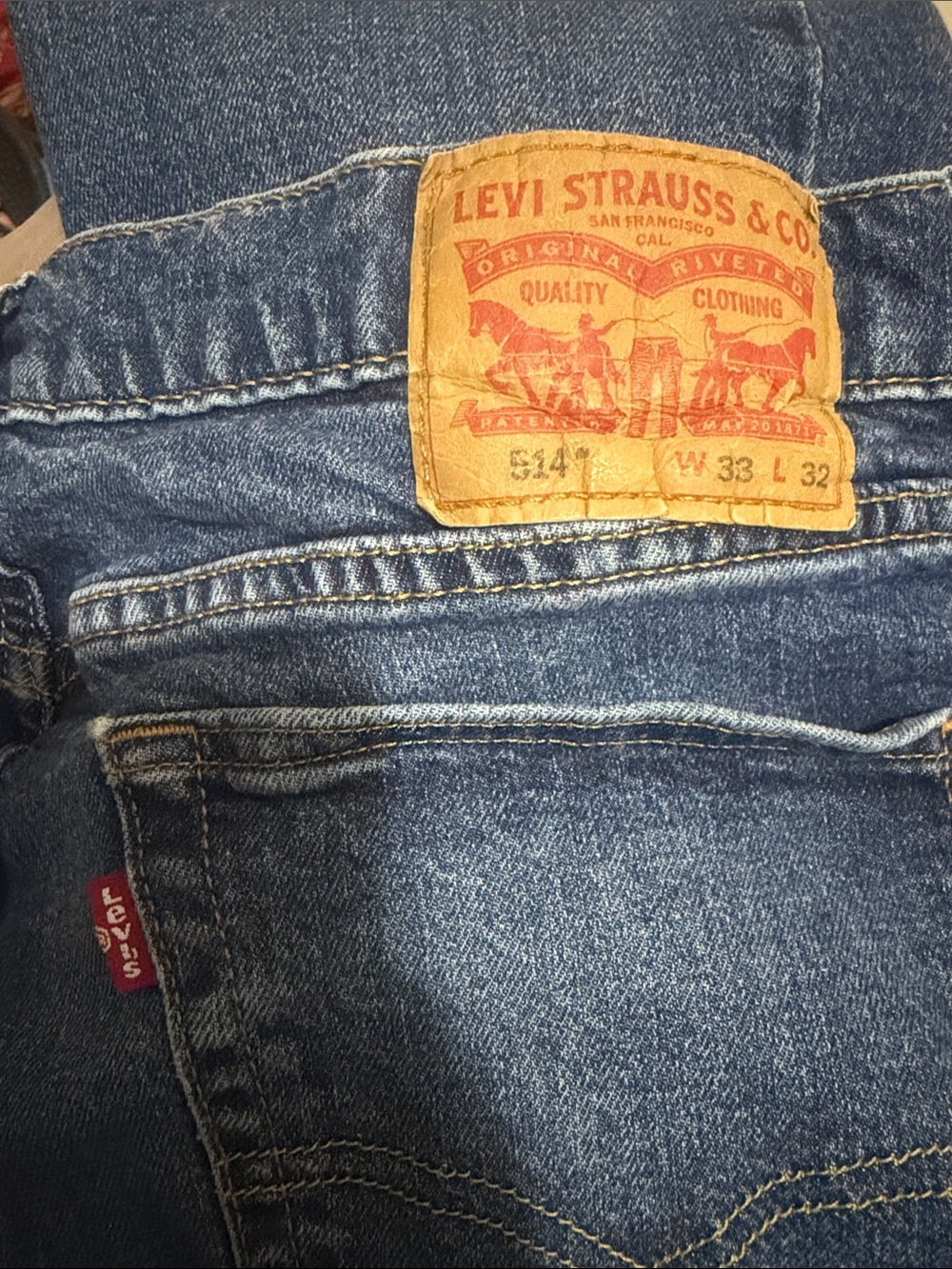 Levi's Men's Relaxed Jeans in Dark Blue Denim with Tan Patch